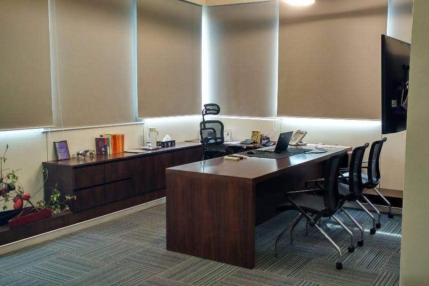 Executive Tables Panel series Custom designed - ExecutiveTablewithBackstorageNonWovenCarpettilesRollingBlinds in Mumbai by Woodware